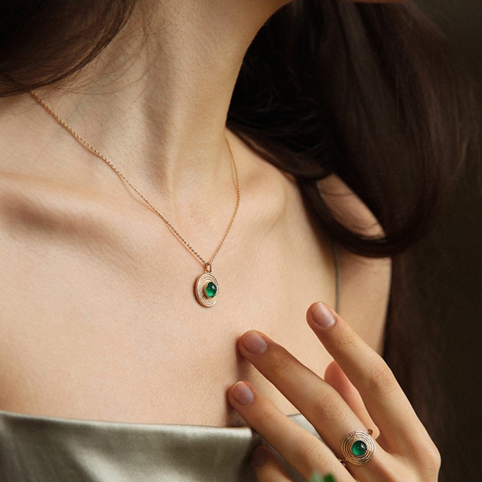Model showing necklace at 45cm length with scoop-neck top.